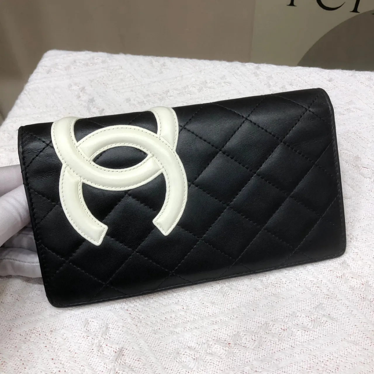 Second-hand black long wallet by Kangpeng, 14 cm wide